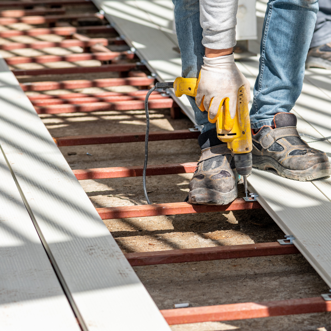 Composite deck flooring being installed.