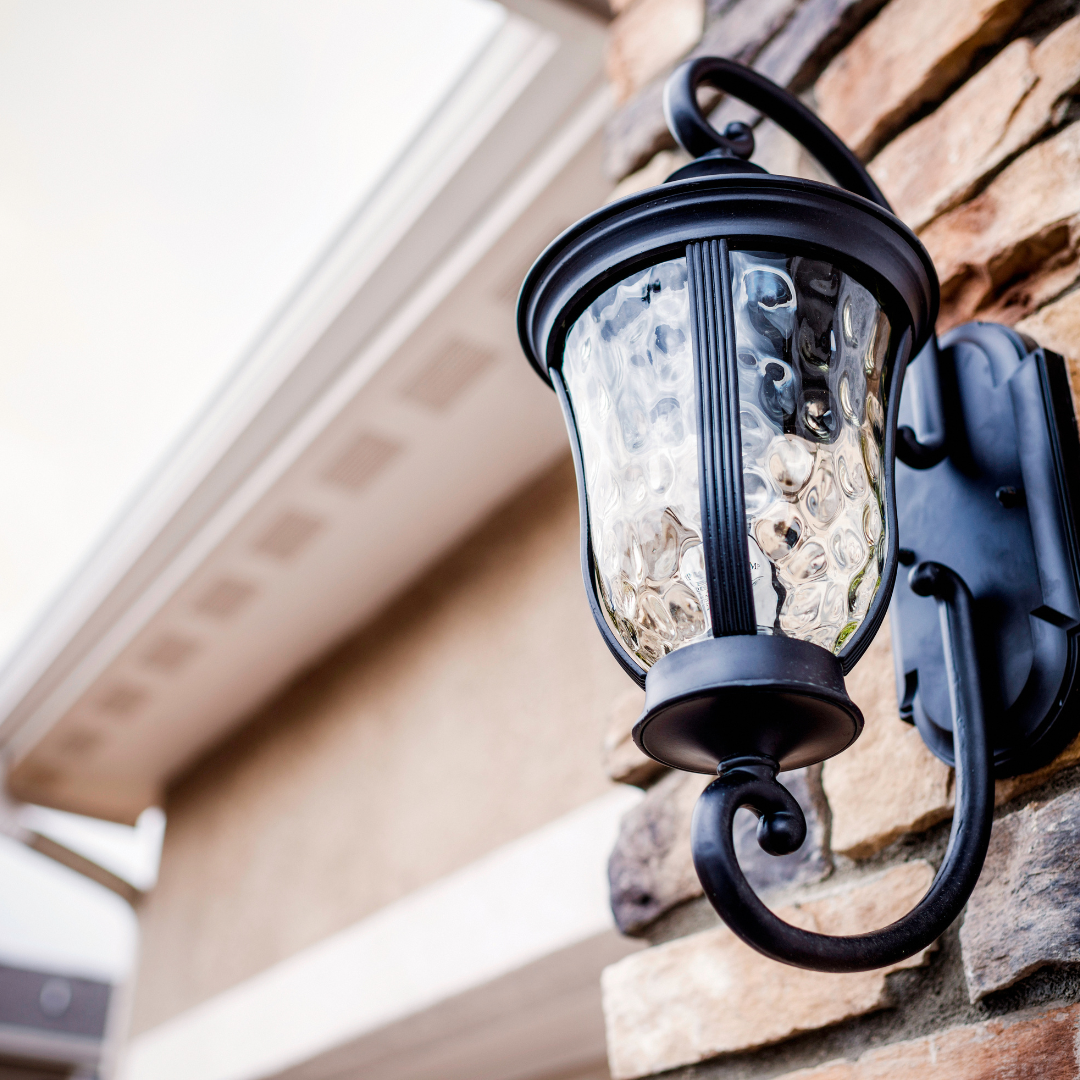 Exterior home lighting fixture installed on a home.