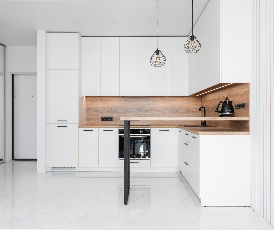 White flat panel cabinets in a modern Vermont kitchen