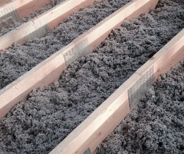 Blown Cellulose insulation in a garage ceiling