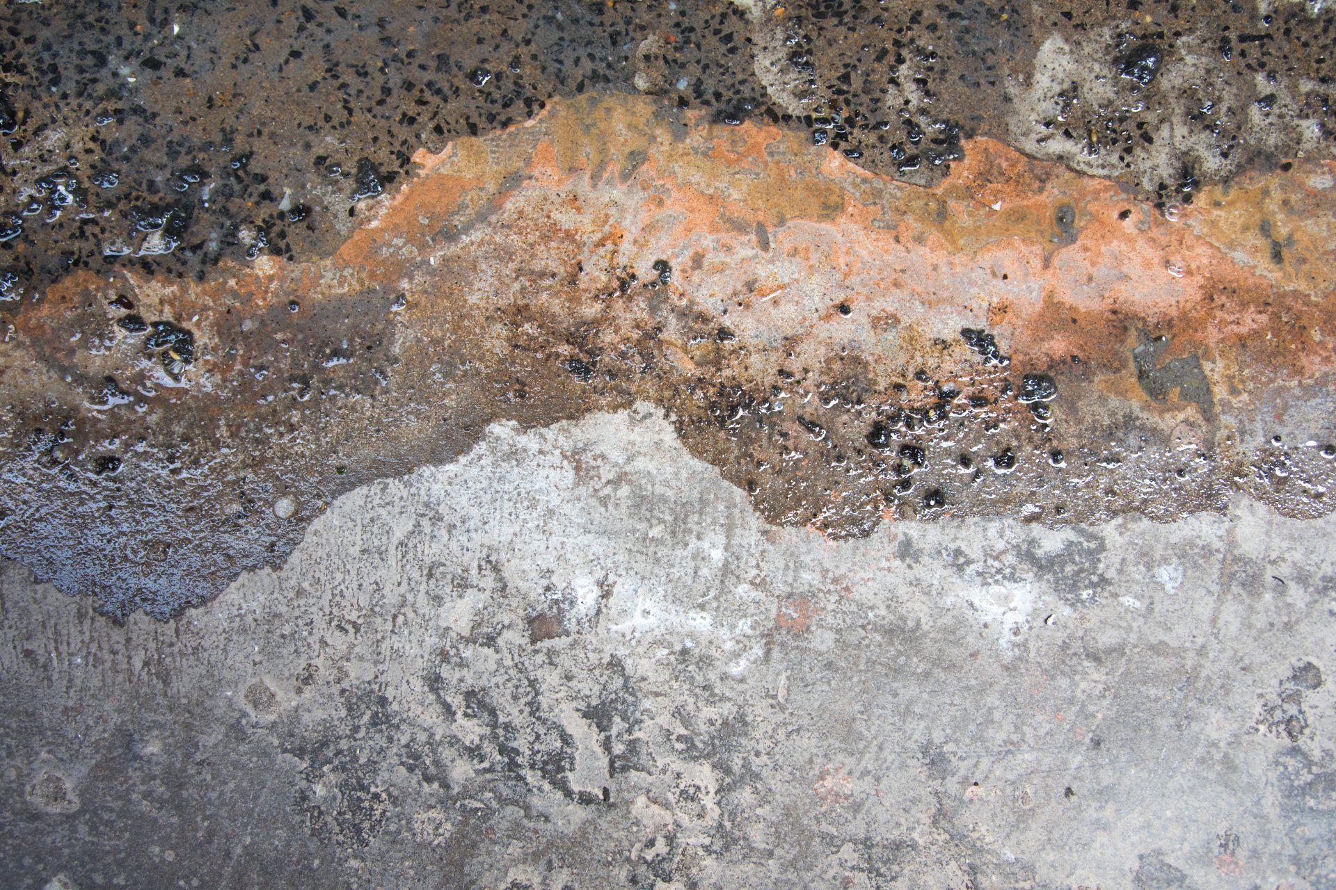 water damage on concrete floor that needs repair