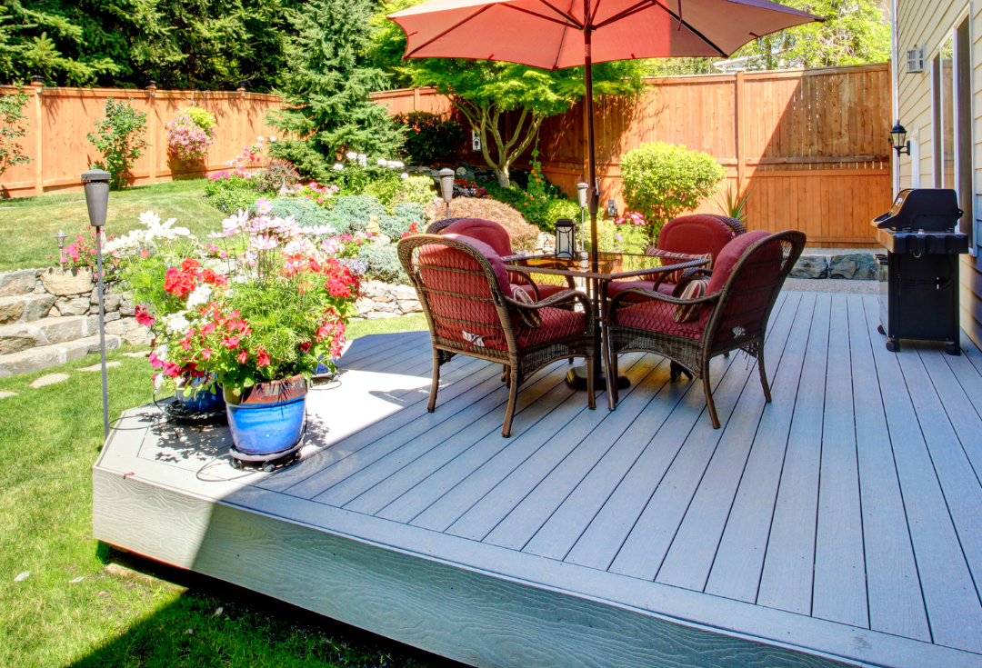Outdoor patio in the backyard of a house.