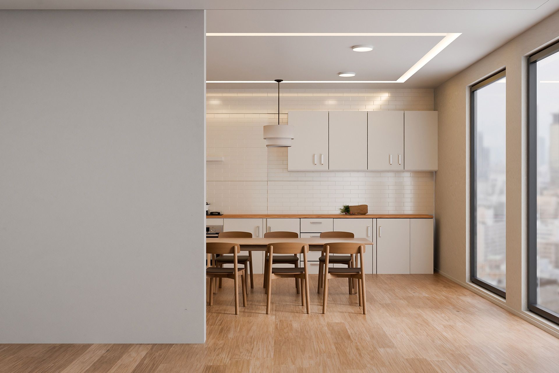 Modern open kitchen and dining area with white cabinets, wood floors, and large windows.