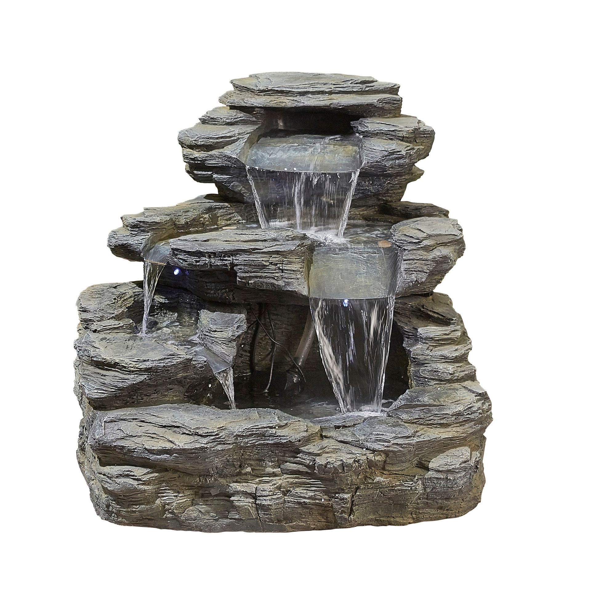 Stone-like water fountain with tiered waterfalls. Water flows down the grey, textured structure.