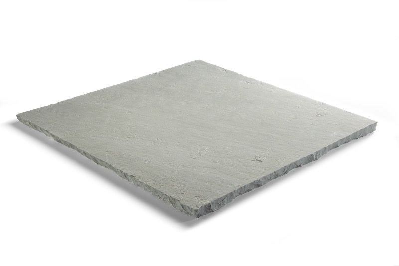 Gray, square-shaped concrete paver on a white background, viewed from a slight angle.
