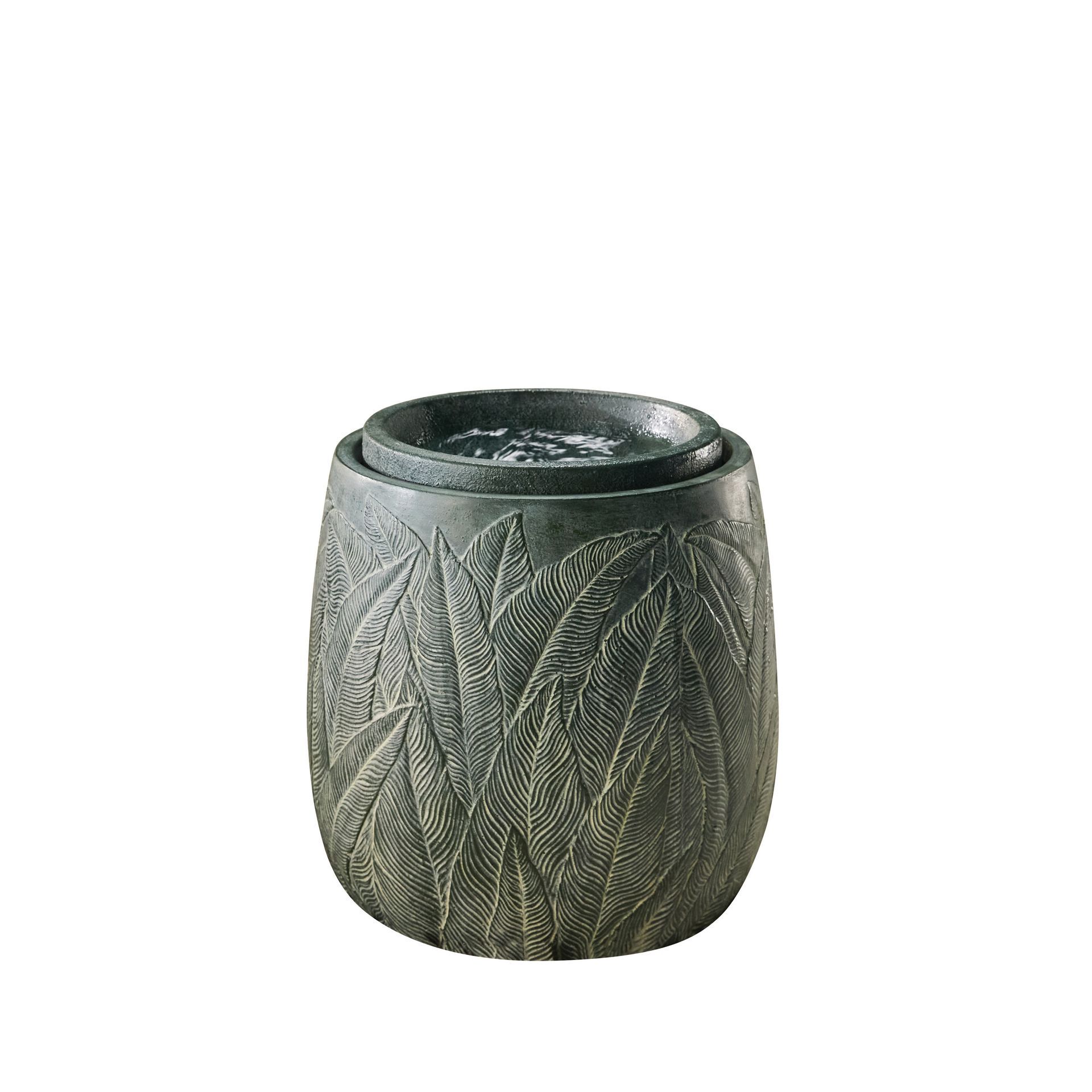 Stone-like outdoor water fountain with leaf pattern. Dark gray color.