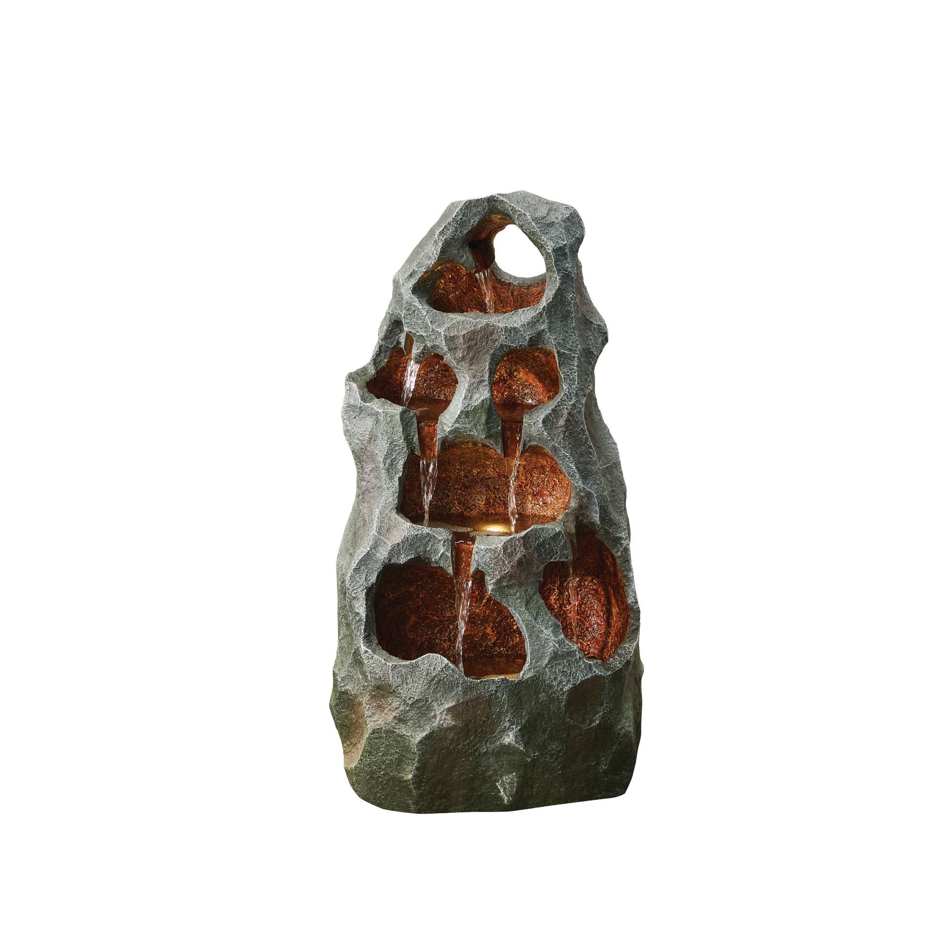 Stone-look waterfall fountain with water cascading from inside a rock structure.