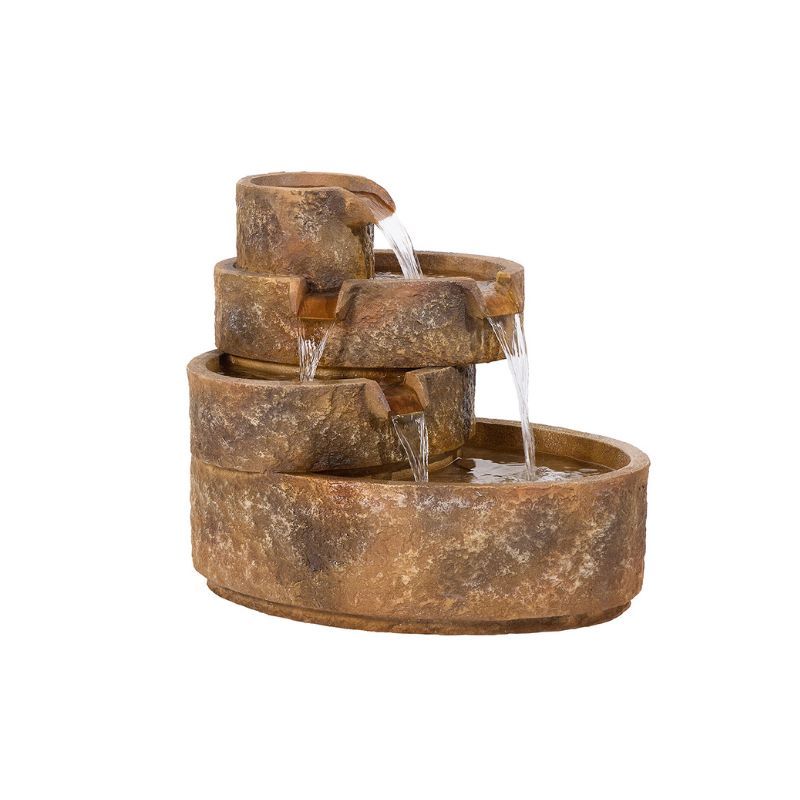 Stone tiered outdoor fountain with water flowing from each level.