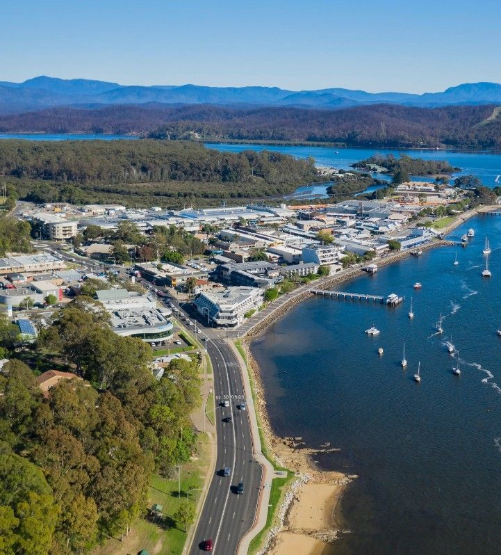 An Aerial View Of A City Next To A Body Of Water — Johnson's Timber Agencies In Batemans Bay, NSW
