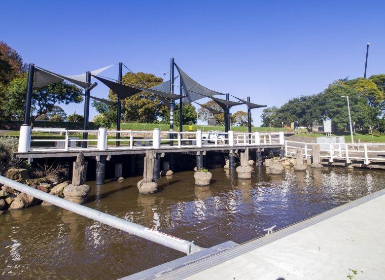 A Bridge Over A Body Of Water In A Park — Johnson's Timber Agencies In Bawley Point, NSW