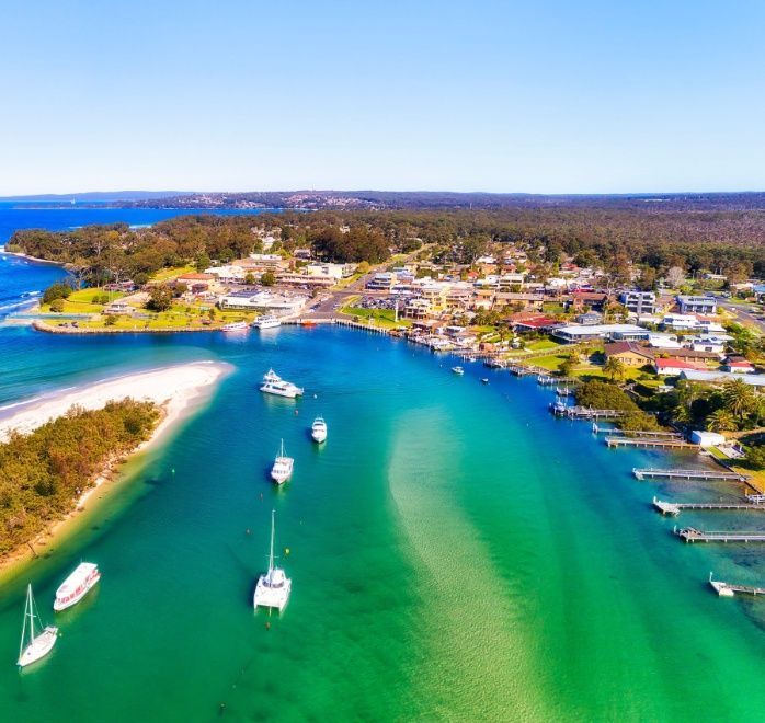 An Aerial View Of A Body Of Water With Boats In It — Johnson's Timber Agencies In Huskisson, NSW