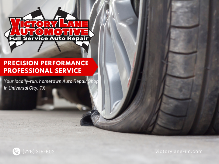 Flat tire on a car, advertising Victory Lane Automotive in Universal City, TX. | Victory Lane Automotive