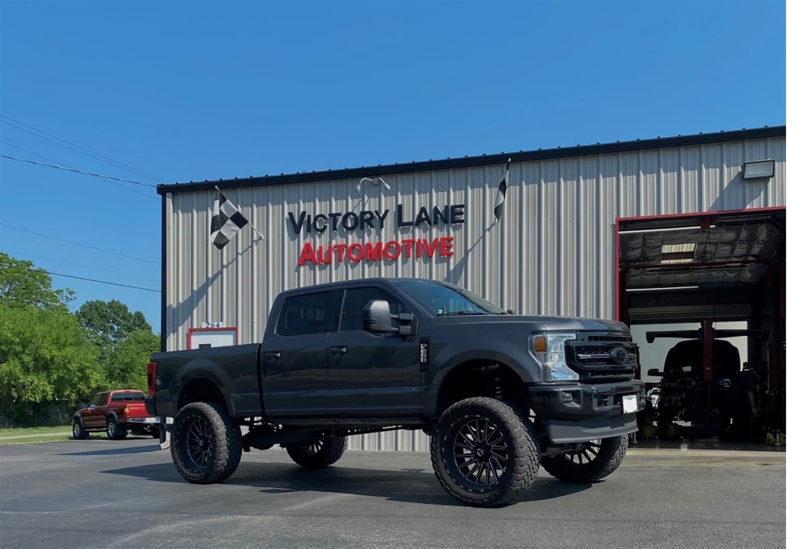 Ford Vechile In the Shop Front | Victory Lane Automotive