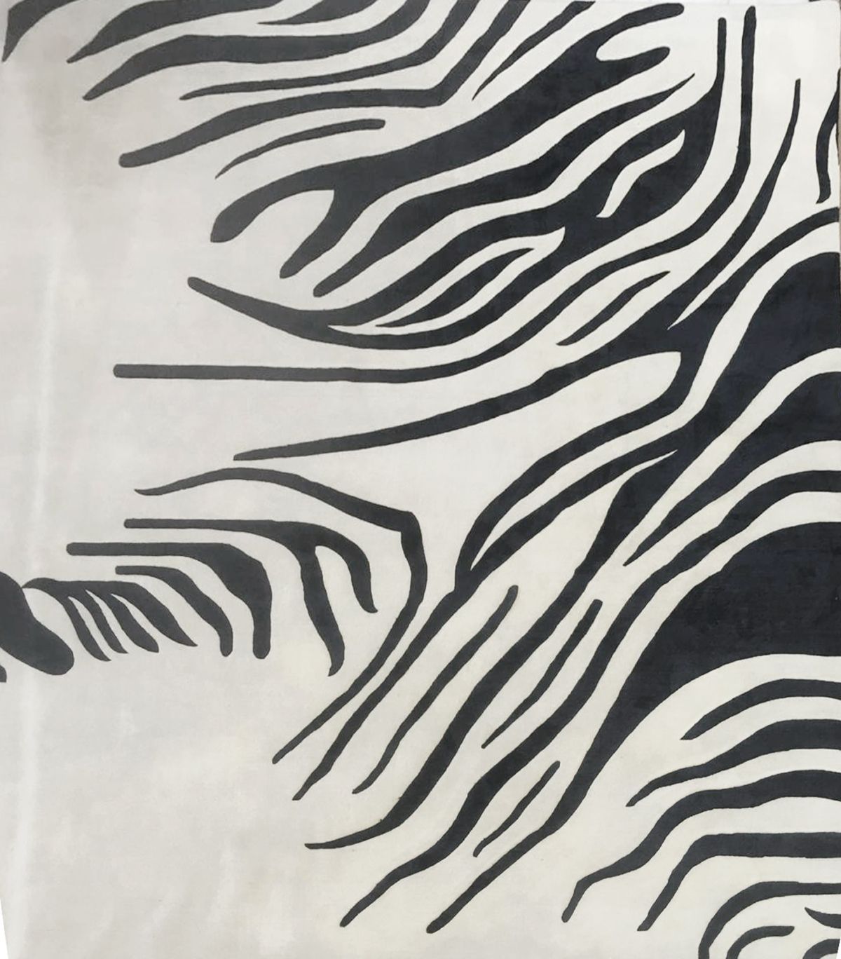 Zebra print rug in black and white.