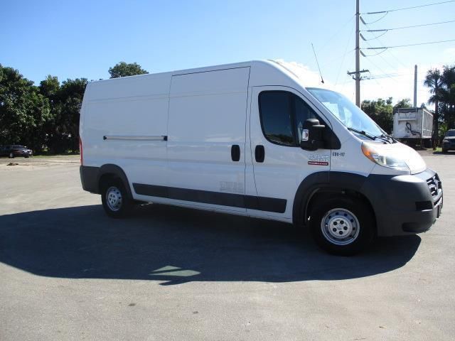 A white van is parked in a parking lot