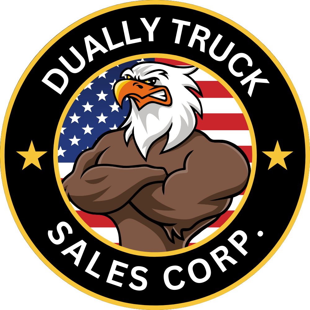 The logo for dually truck sales corp shows an eagle with his arms crossed