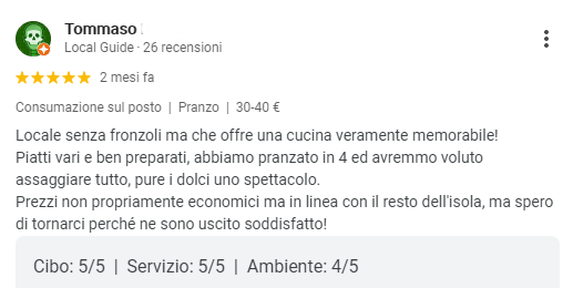 Screenshot di una recensione di Google di un ristorante in italiano, con valutazione a 5 stelle e testo su pizza e servizio.