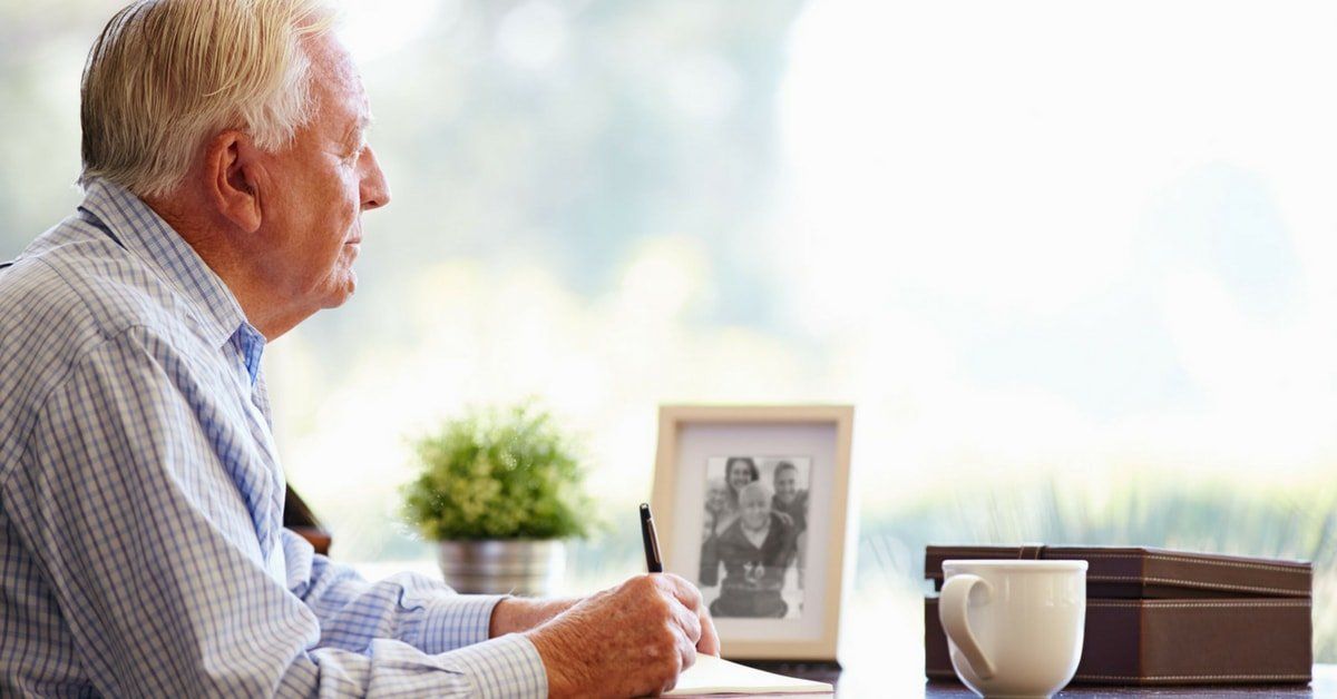 Grieving with a Purpose elderly Man Writing Notes