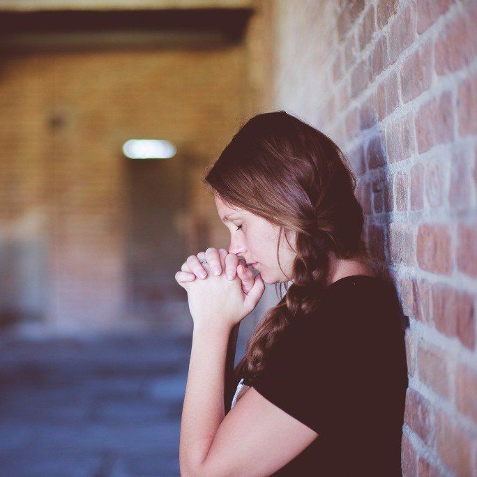 Grieving with a Purpose Lady Praying