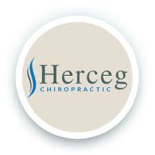 Logo for Herceg Chiropractic: beige circle with 