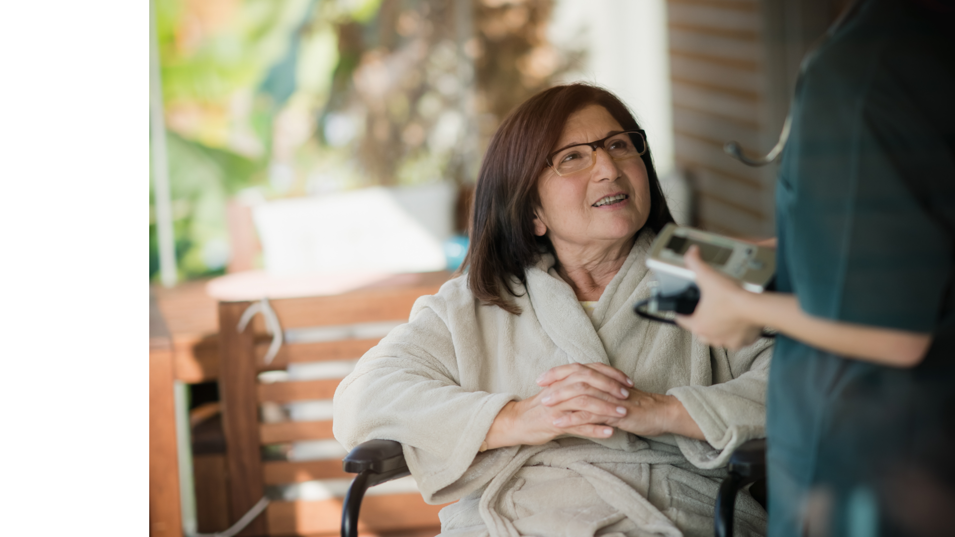 an elderly woman in a bathrobe sits on a porch with her hands folded, Angel Leaf Home Care Provider
