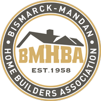 Bismarck-Mandan Home Builders Association logo with house roof graphic and “BMHBA EST. 1958” text