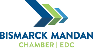 Bismarck Mandan Chamber EDC logo with blue and green chevrons and text on white background