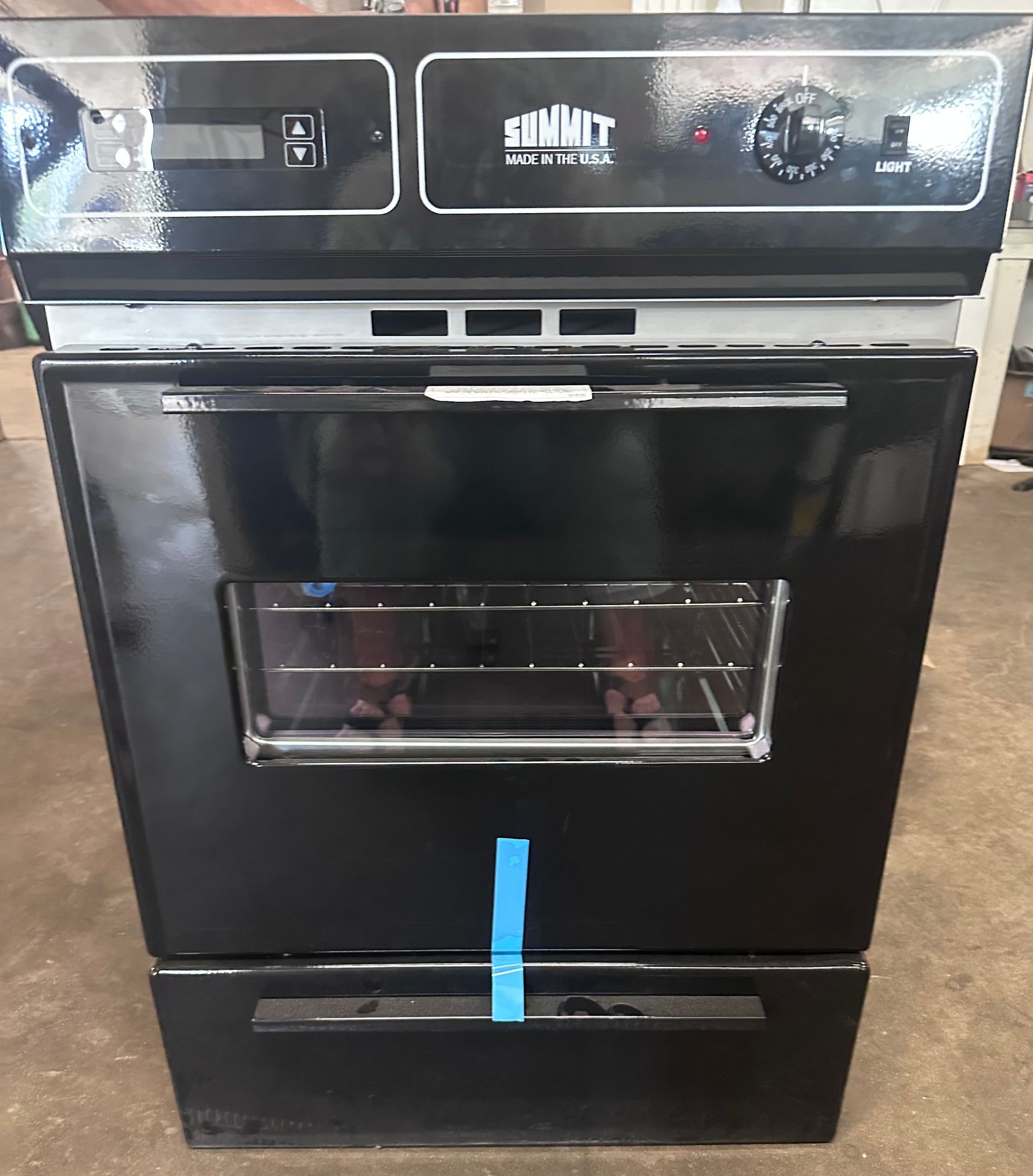 A black stove with the word smart on it