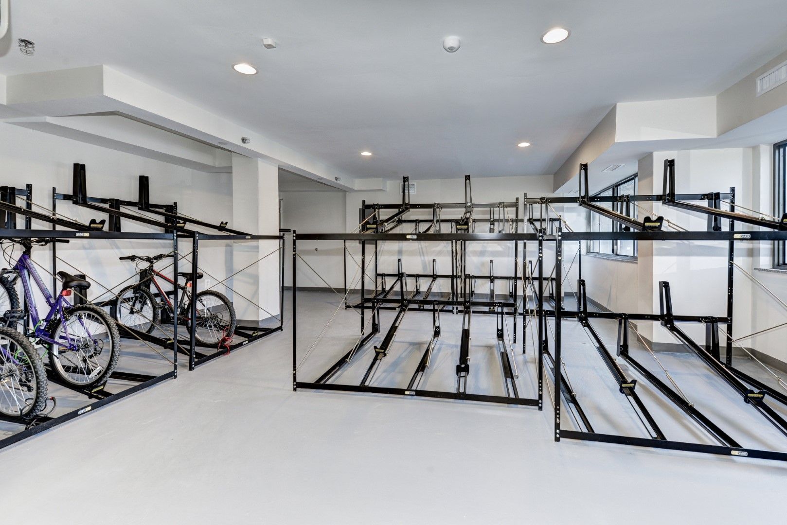 A bicycle rack with a lot of bikes in it at The Mark by Solaire in Alexandria, VA.