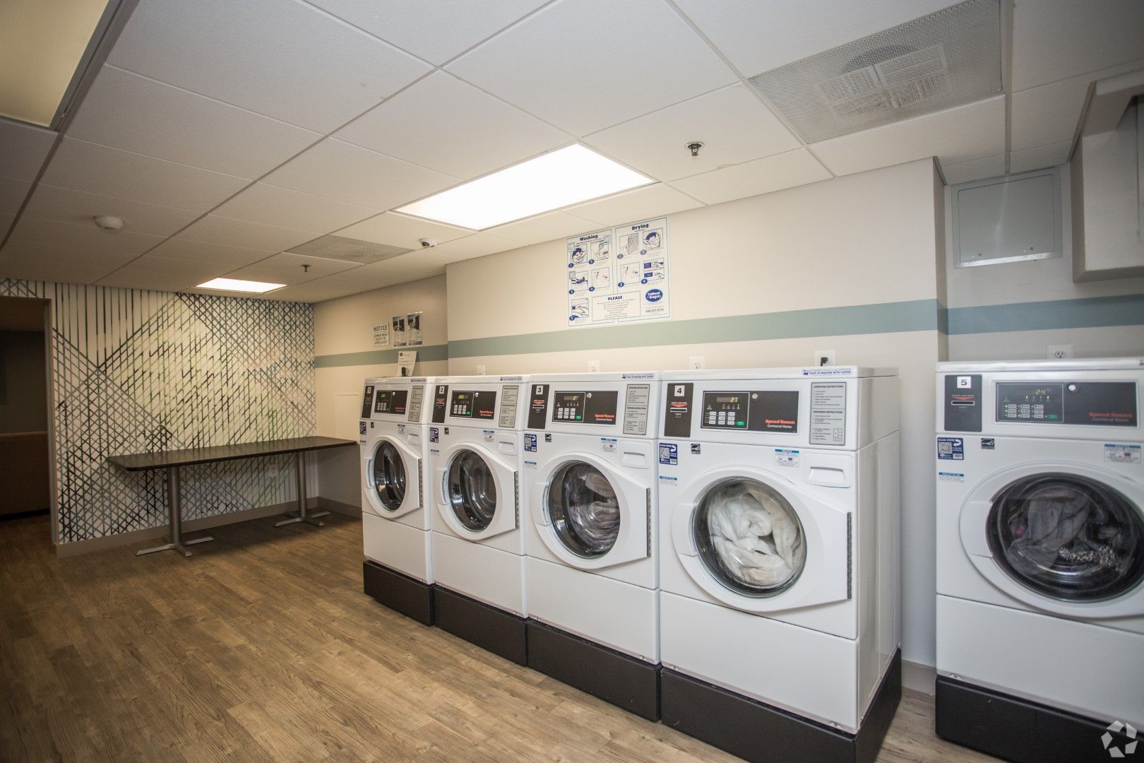 Laundry room at The Mark by Solaire in Alexandria, VA.