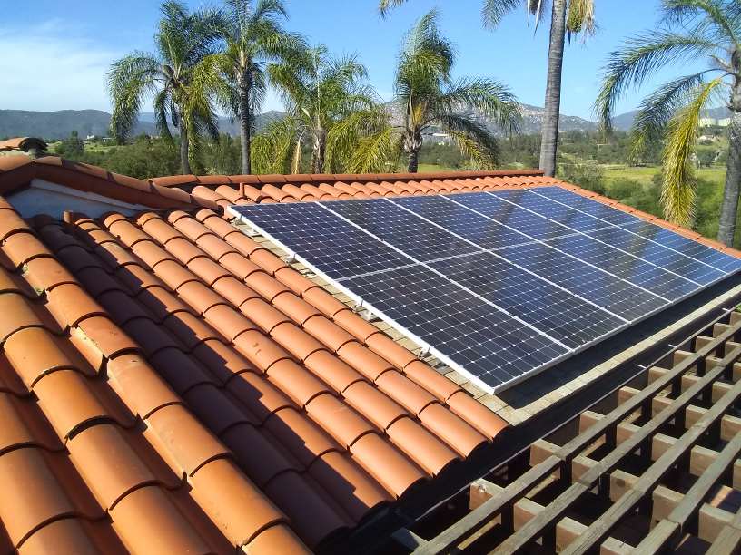 A roof with a lot of solar panels on it