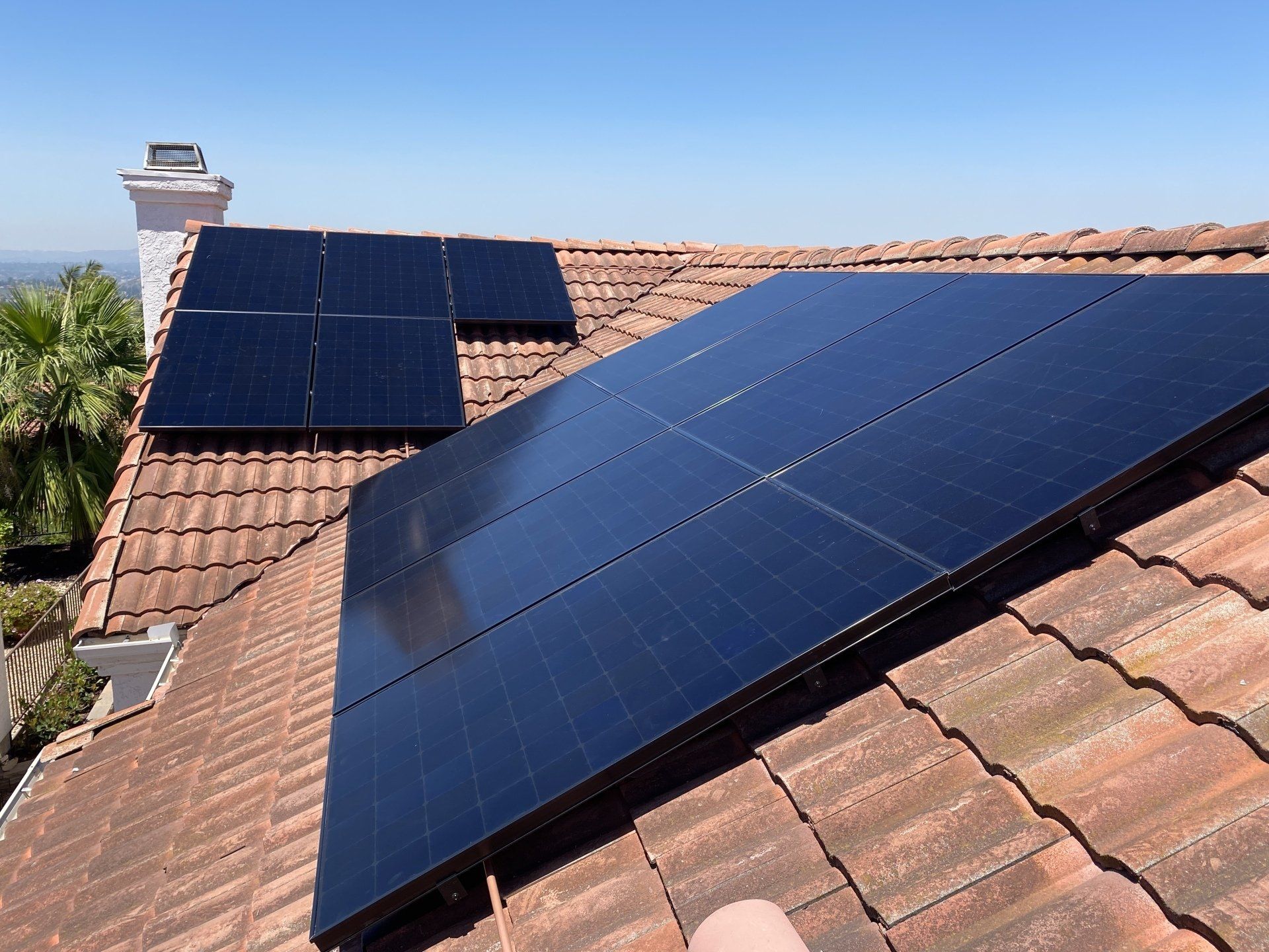 A roof with a lot of solar panels on it