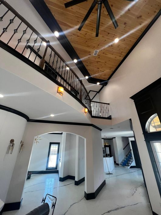 recessed lighting with large ceiling fan in home