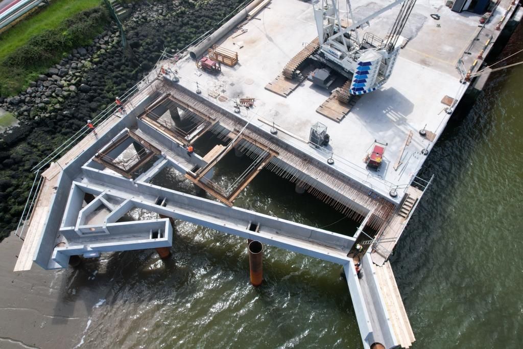 An aerial view of a bridge under construction in the water