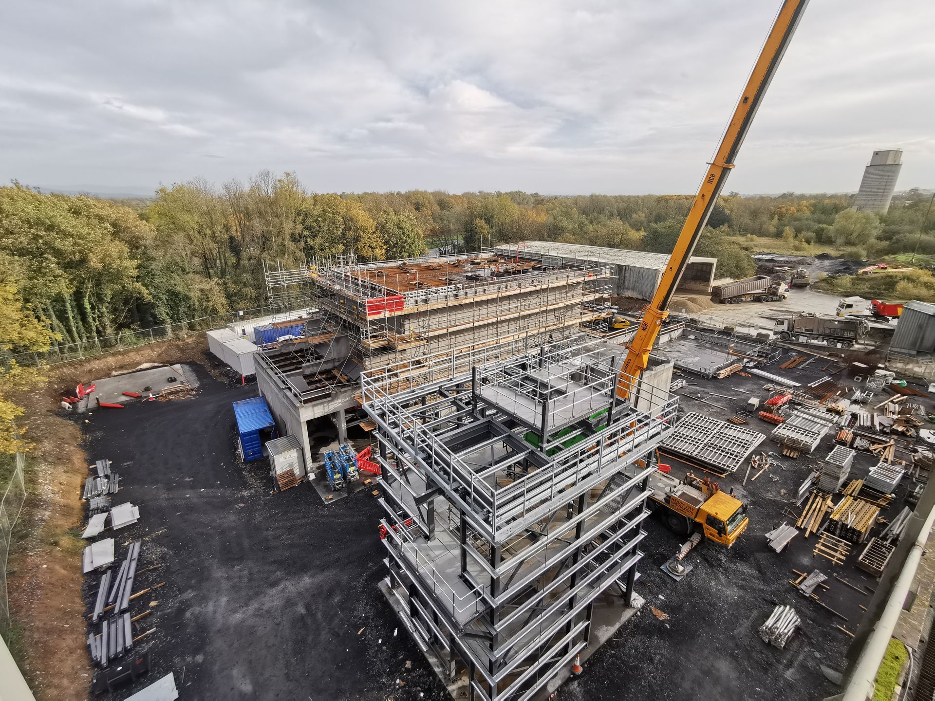An aerial view of a large building under construction