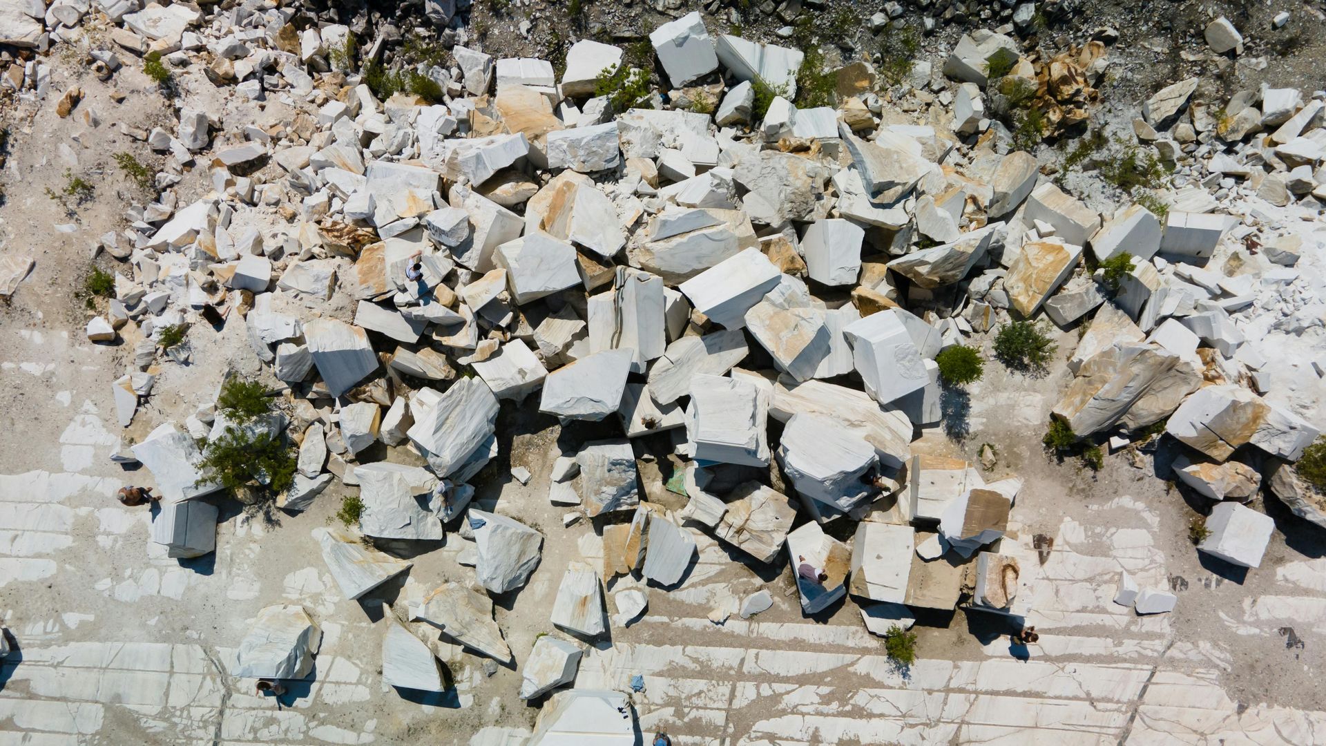 An aerial view of a pile of rocks on the ground
