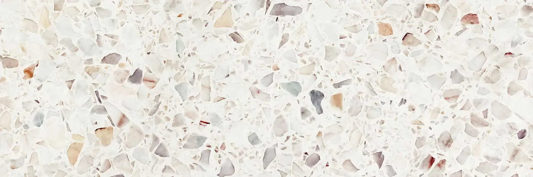 Light beige speckled stone or terrazzo surface texture