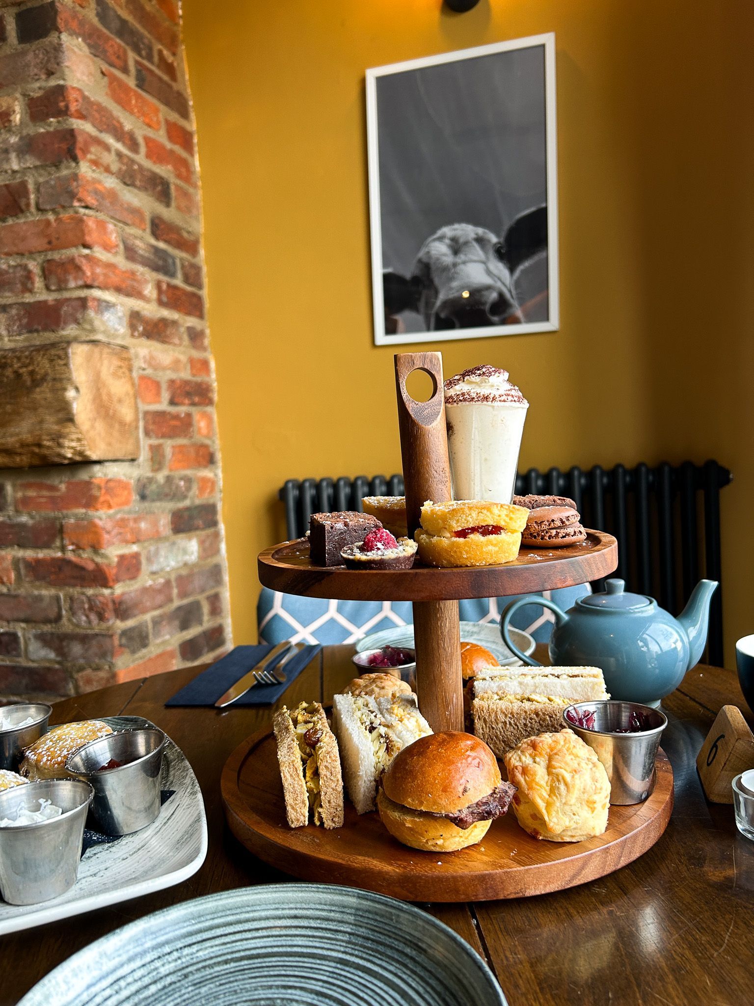 A two-tiered afternoon tea served in The Acle Steak, Norfolk Broads