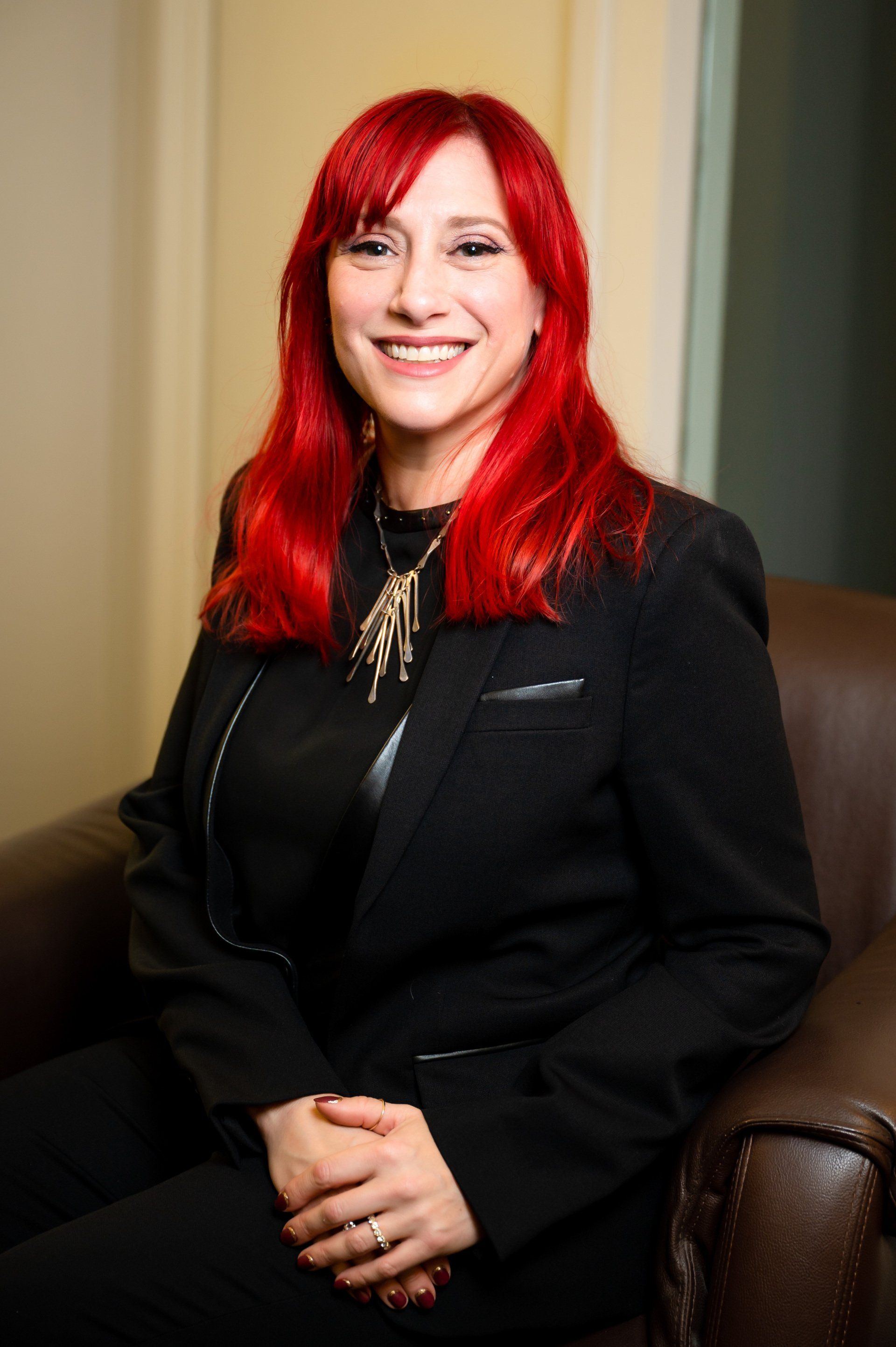 About lawyer Jennifer Brown-DiBlasi in a business suit