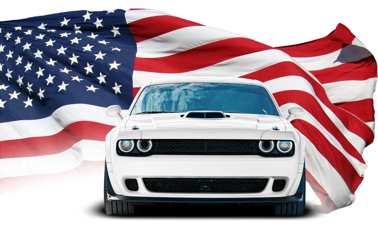 White Dodge Challenger in front of a waving American flag. | Maverick Collision
