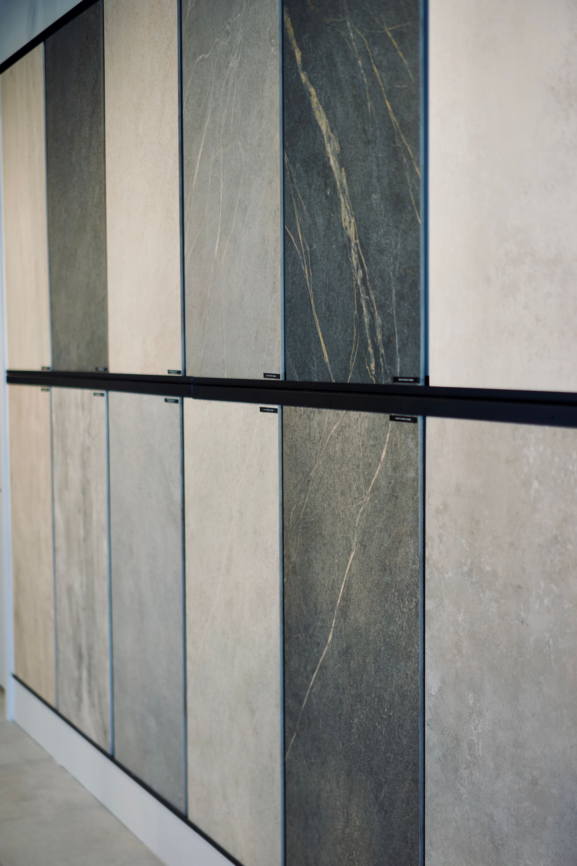 A wall with a lot of different tiles on it