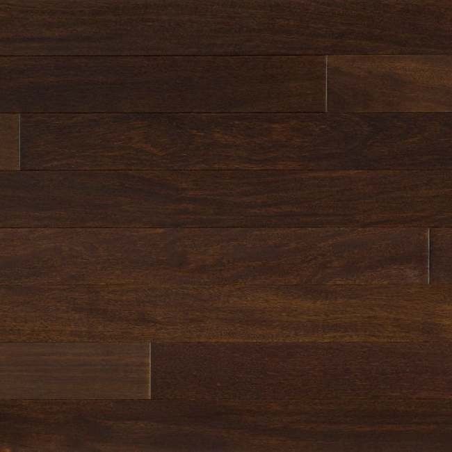 A close up of a dark brown wooden floor.