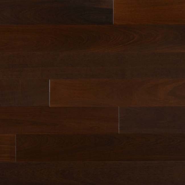 A close up of a dark brown wooden floor.