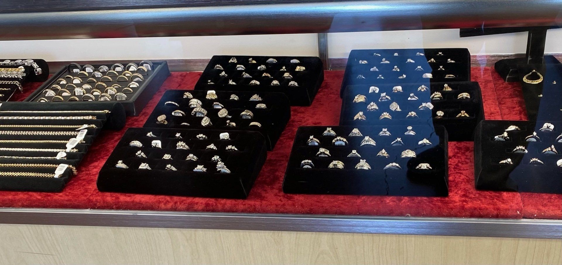 Wedding Rings on Stack of Money — Baton Rouge, LA — Quick Cash Loan & Jewelry