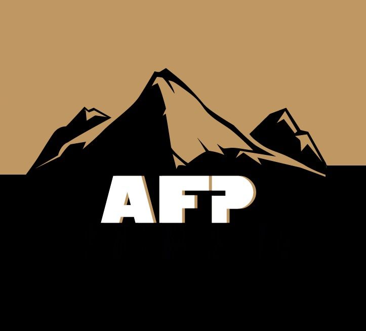 Black mountain silhouette above bold white “AFP” text on a tan background