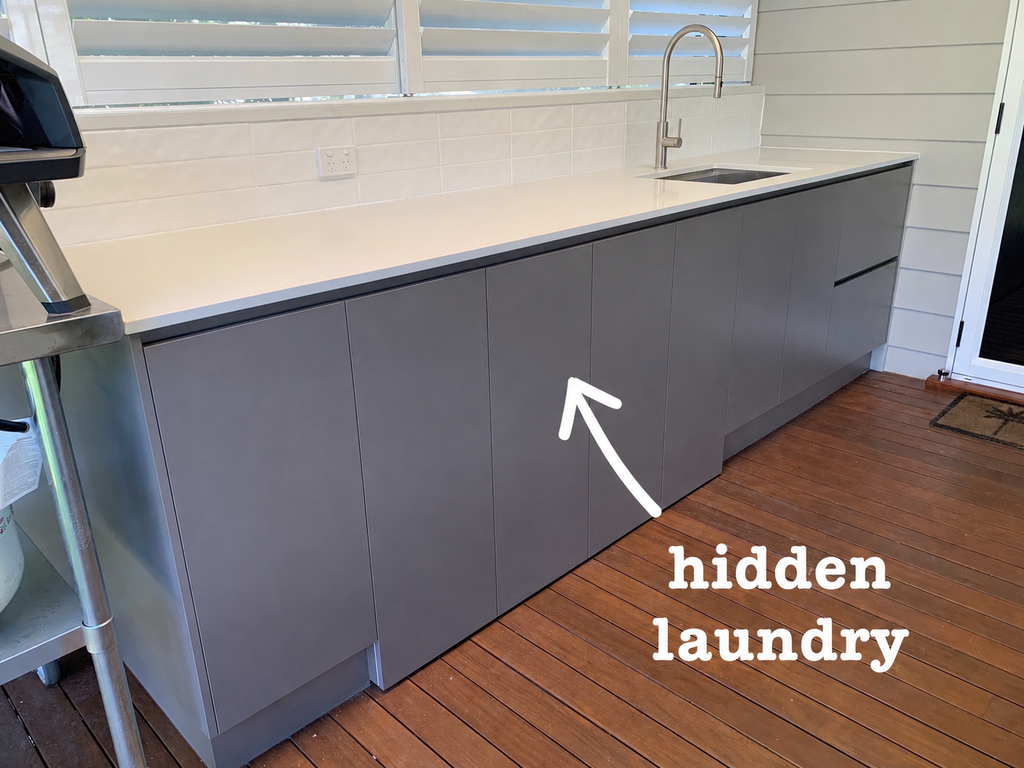 laundry cabinets by WCC Kitchens and Cabinets