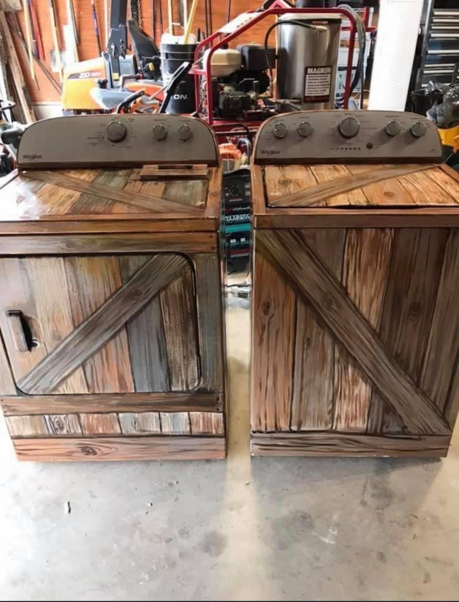 Two weathered wooden crates side by side in a workshop, one with a blue rope handle and one with diagonal slats