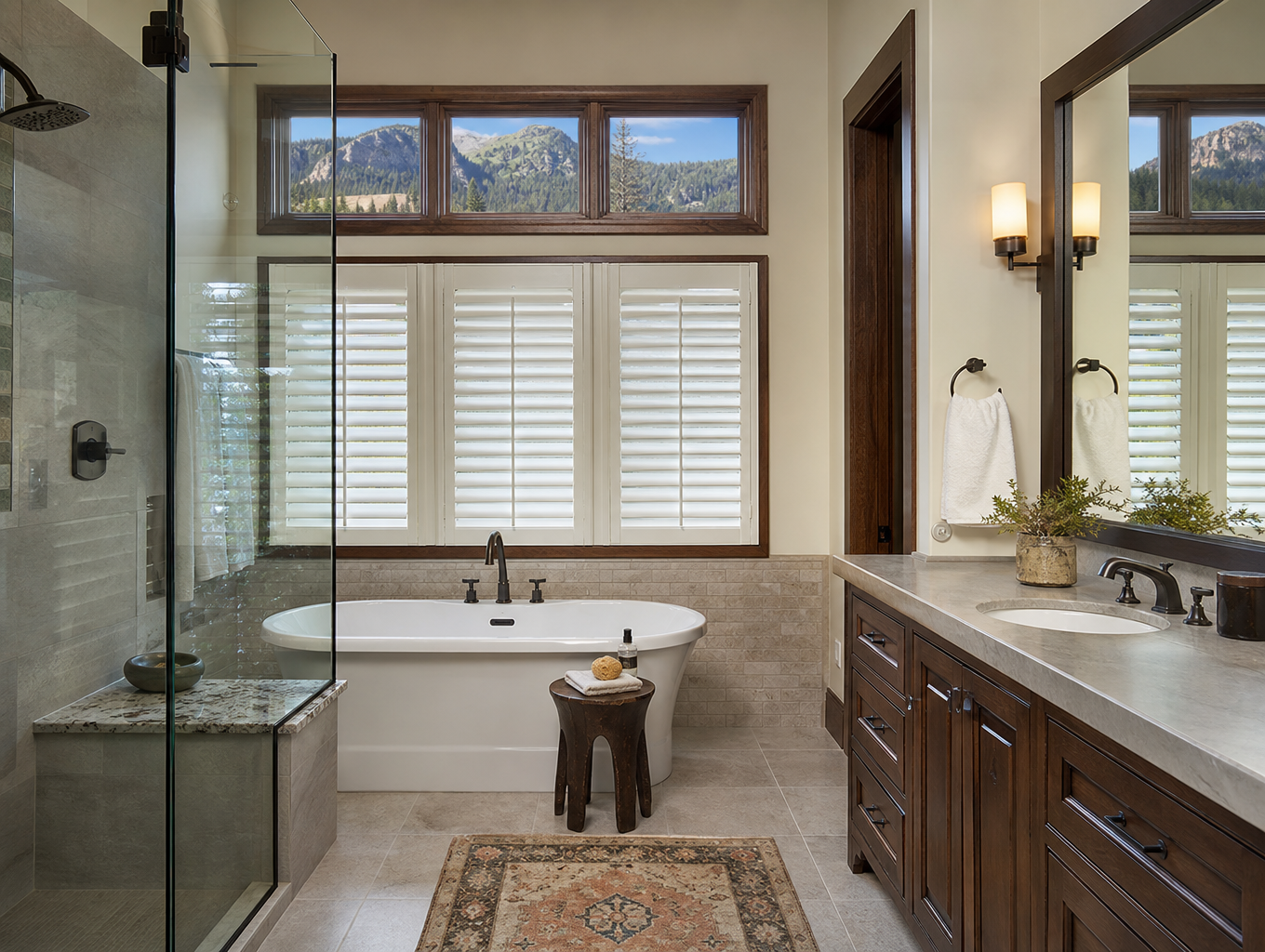 Luxurious bathroom with a tub, glass shower, vanity, interior shutters, and dog statue on the tiled floor