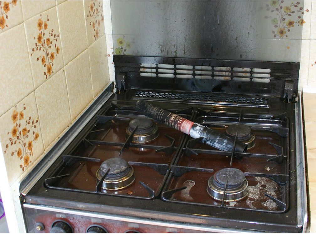 Fire safety stick used on cooking grill fire