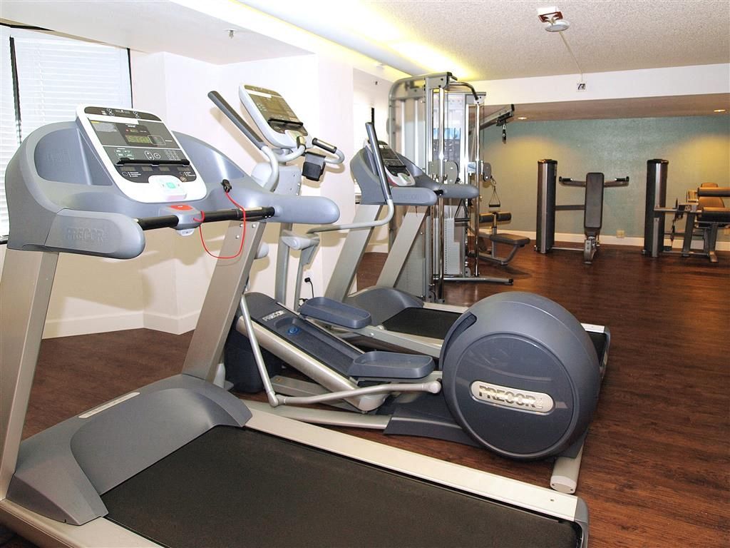 Community gym with treadmills and cardio equipment at Tower 737, offering apartments in San Francisco, CA.